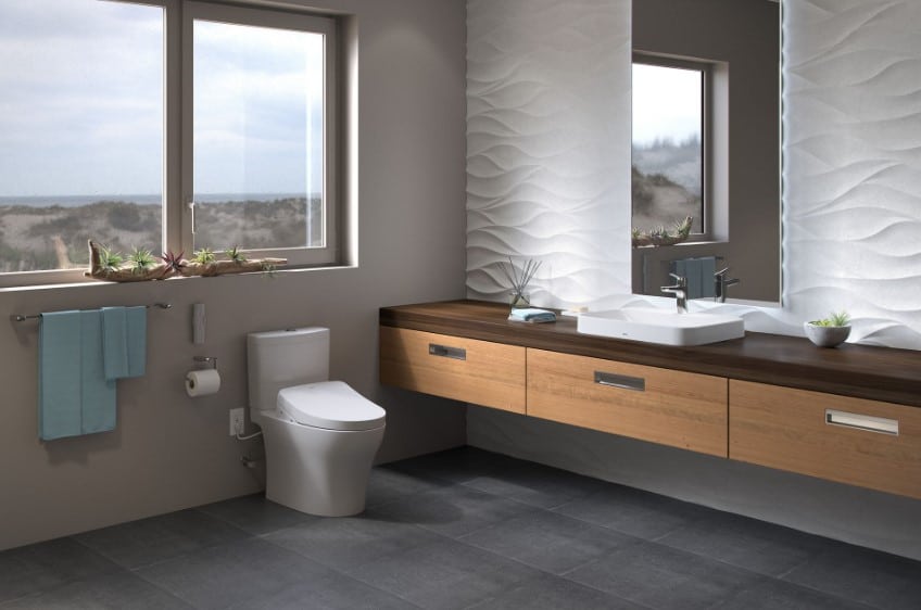 Modern master bathroom with dark grey floor and wavy white wall tiles