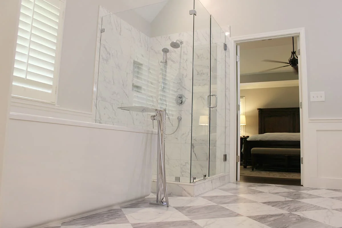 Grey and white bathroom floor and shower