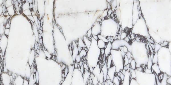 Violeta marble with white background and marble veins of a natural stone tile