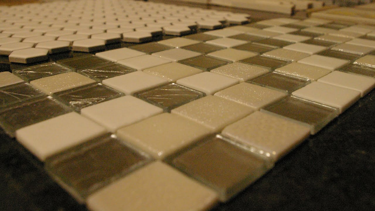 mosaic tile sample with white and cream glass